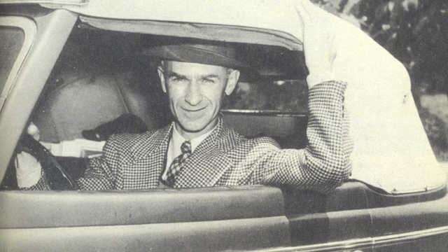 Photo of Pyle behind the wheel, documenting the “extraordinary within the ordinary” in American life and culture during the 1930s.